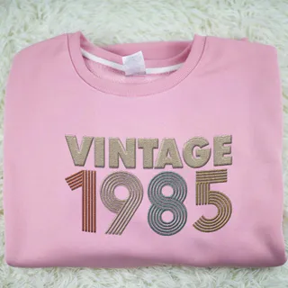 Vintaged 1985 Embroidered Sweatshirt – Pink